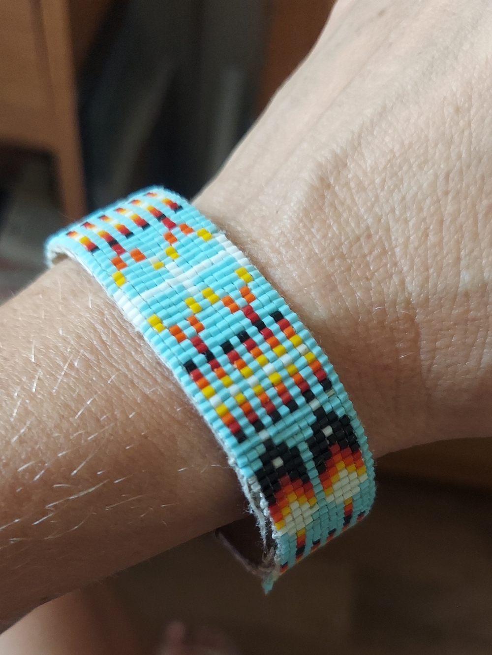 Handmade Native American Beaded Turquoise Bracelet with Multicolor Pattern